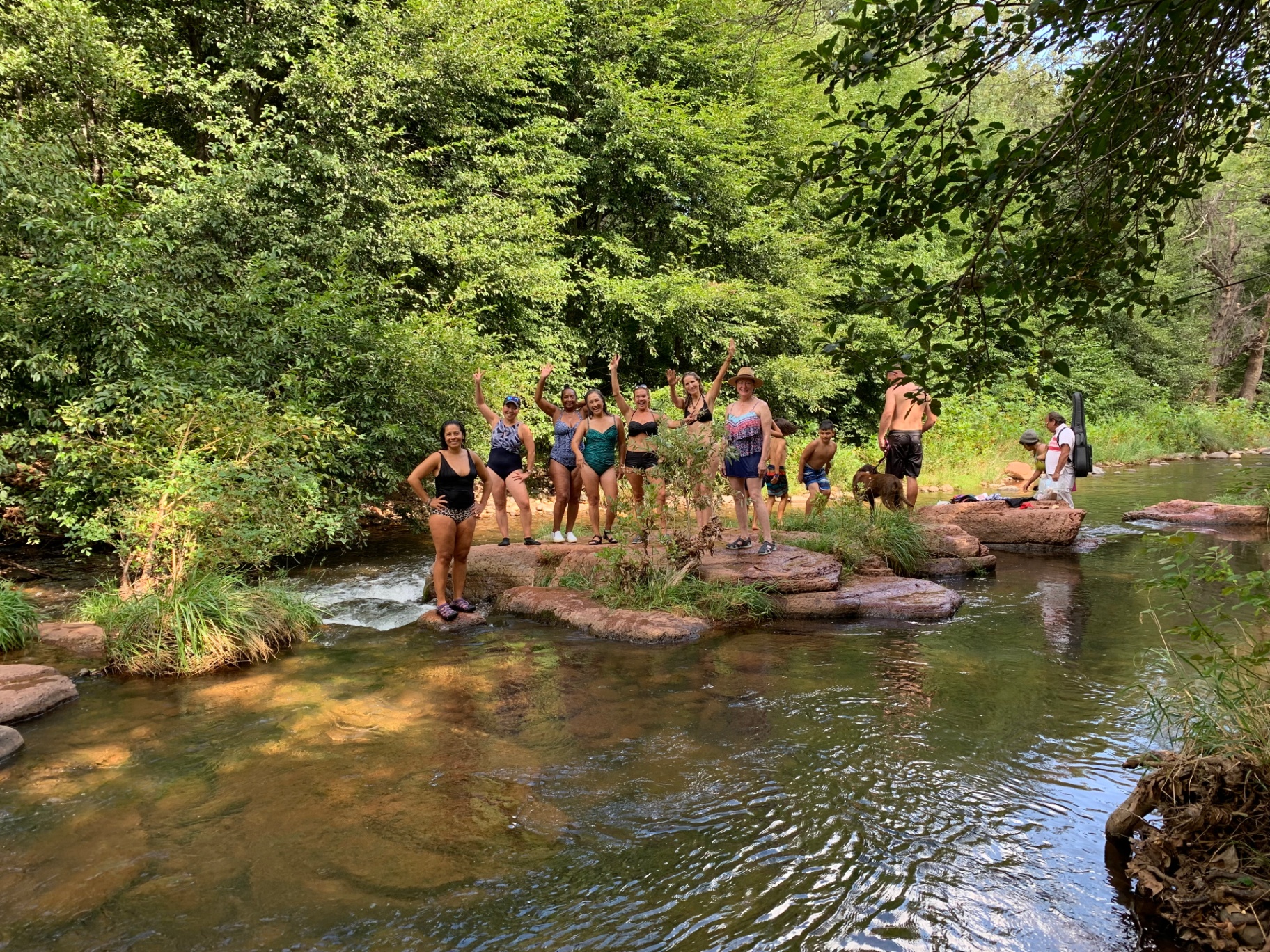 Women's retreat circle at a Sedona creek